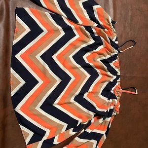 Tacera string on shoulder top